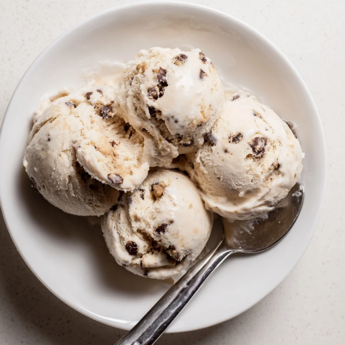 Guilt-free cottage cheese ice cream mixed with sweet cookie dough for a tasty treat.  
