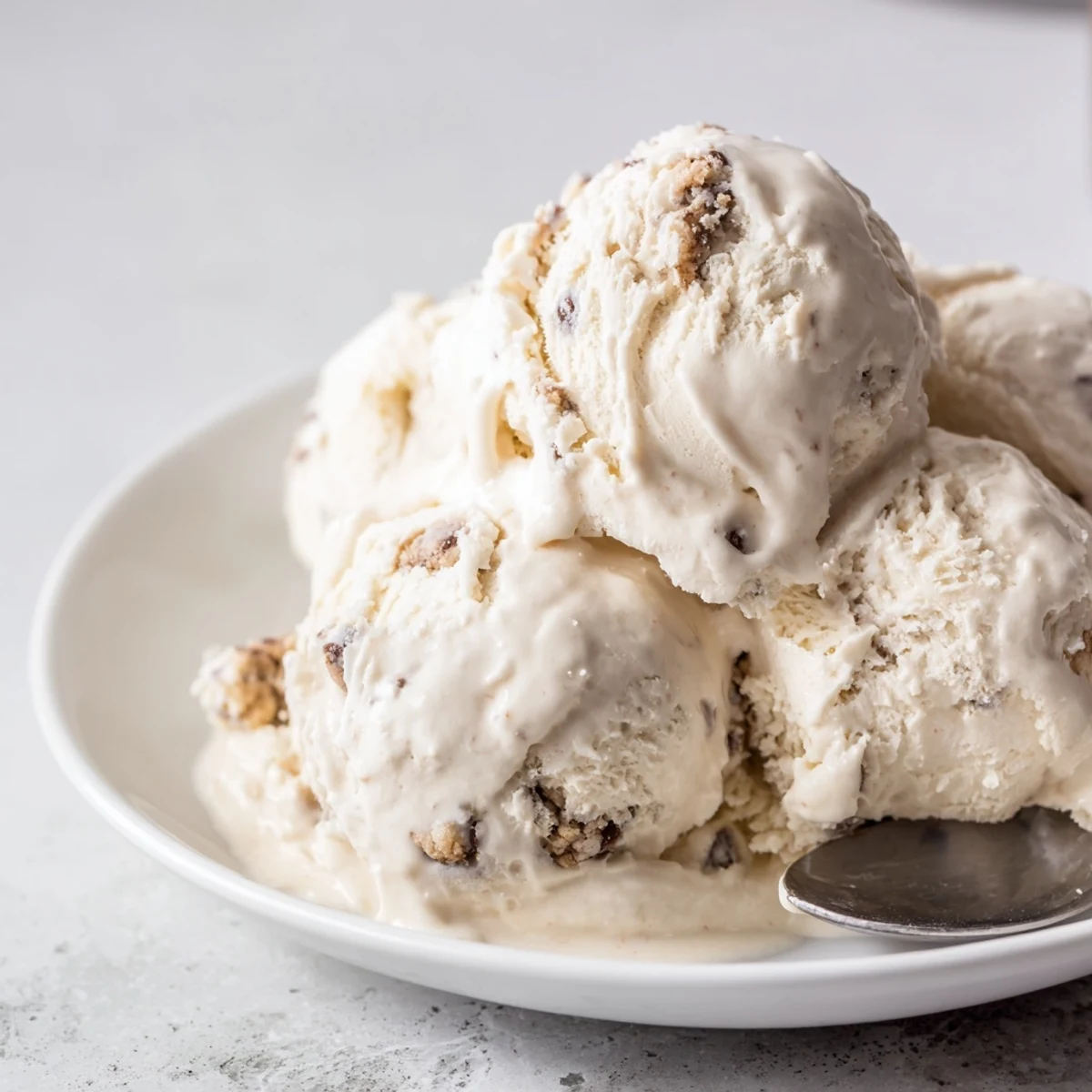 Homemade cottage cheese ice cream with chocolate chip cookie dough for a refreshing dessert.