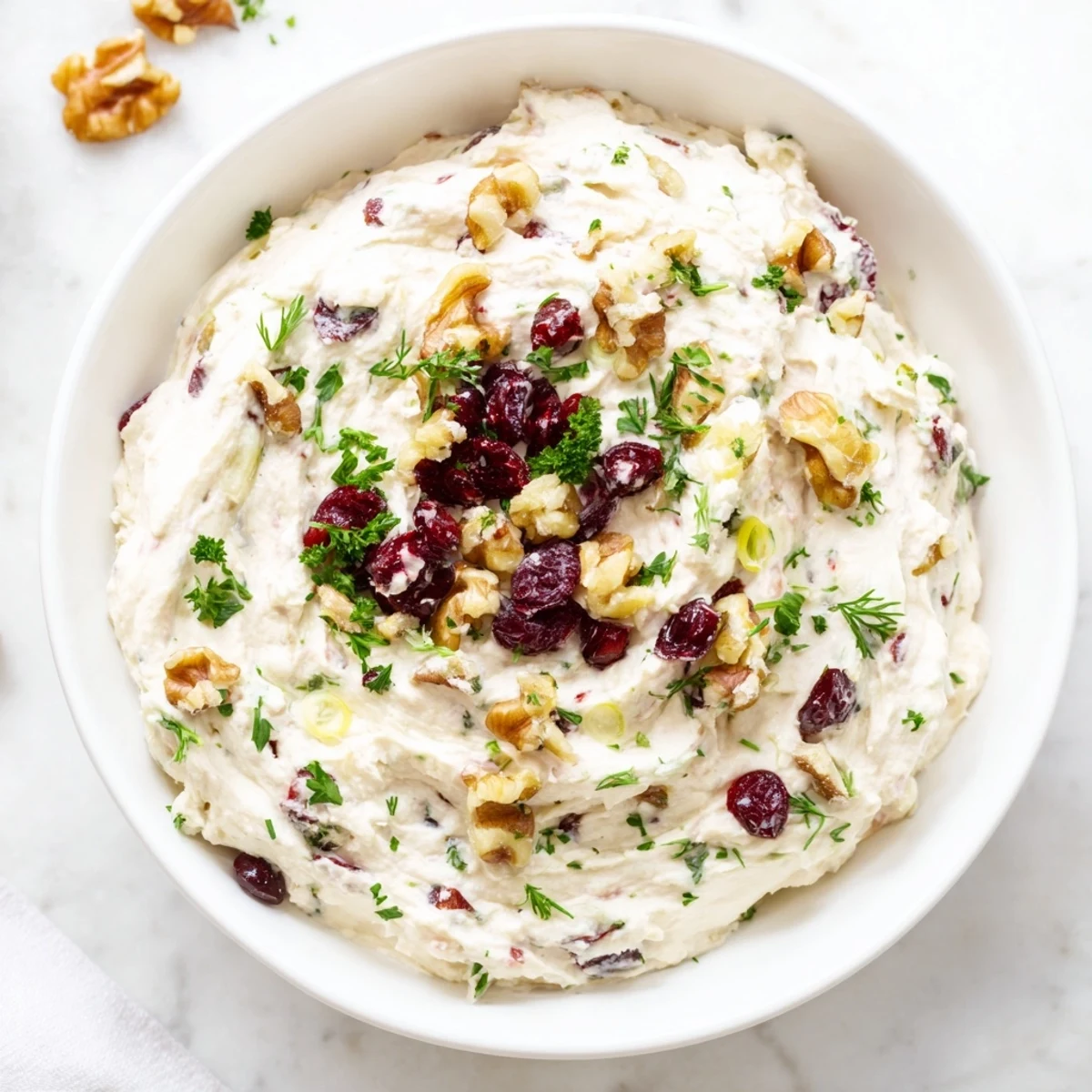 Creamy Lightened Holiday Cream Cheese Dip, ready to serve with crackers, is a beautiful appetizer.
