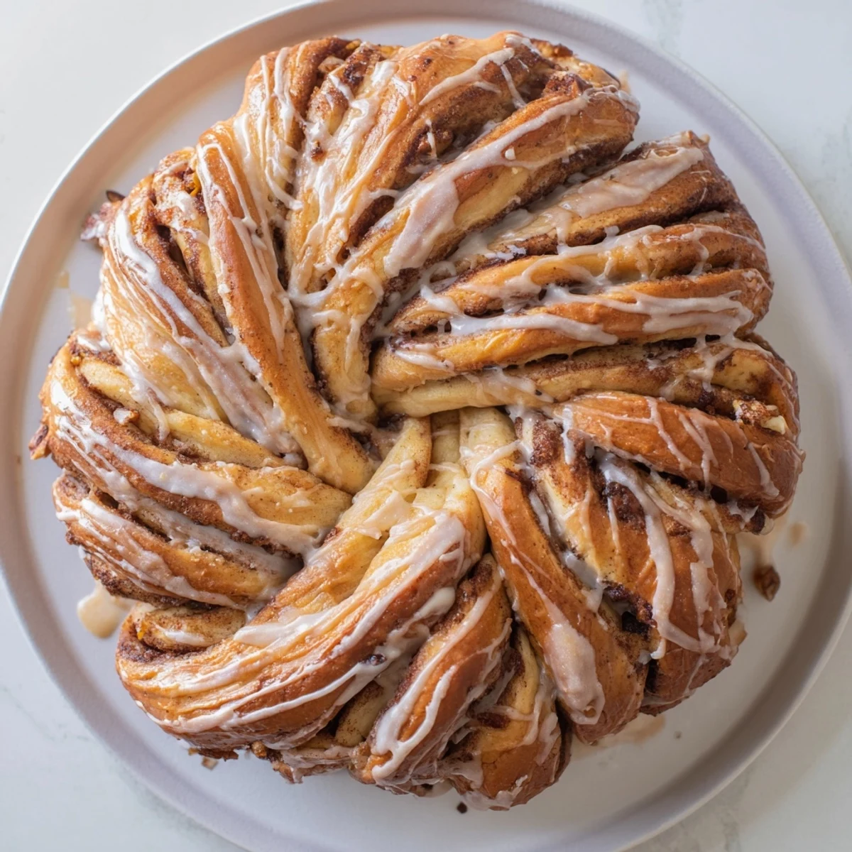 A freshly baked Cinnamon Swirl Christmas Tree Bread, golden-brown and ready for holiday brunch.
