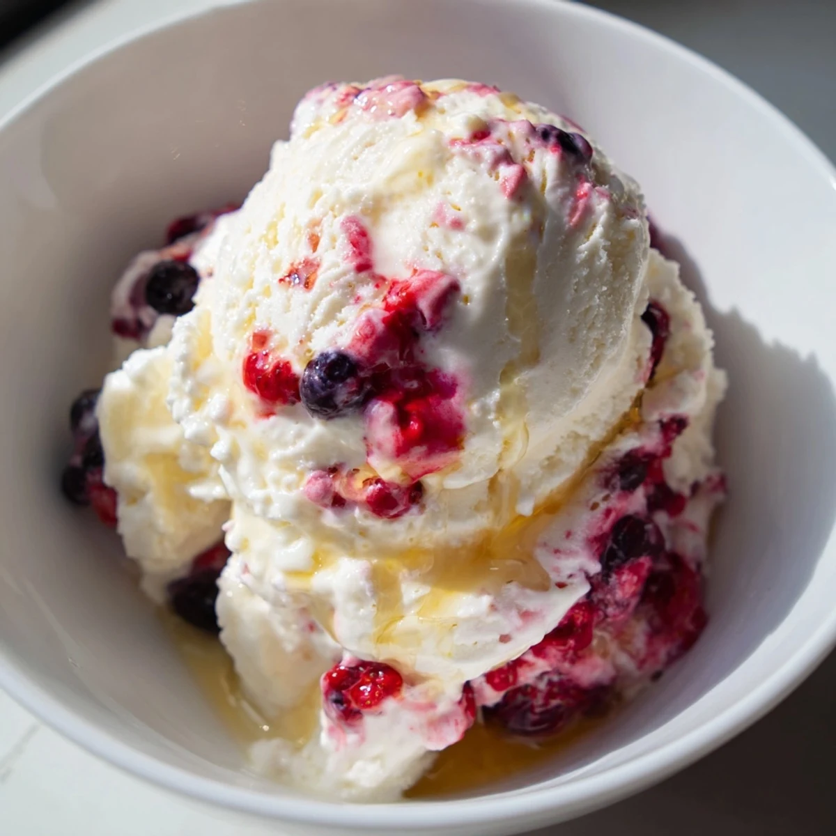 Vivid image of homemade Cottage Cheese Ice Cream, showing a creamy, thick dessert texture.