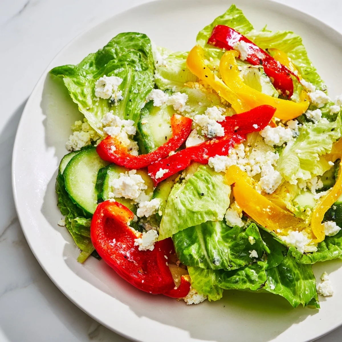 A bowl overflowing with a delicious Bella Hadid Salad, perfect for a light vegetarian lunch.
