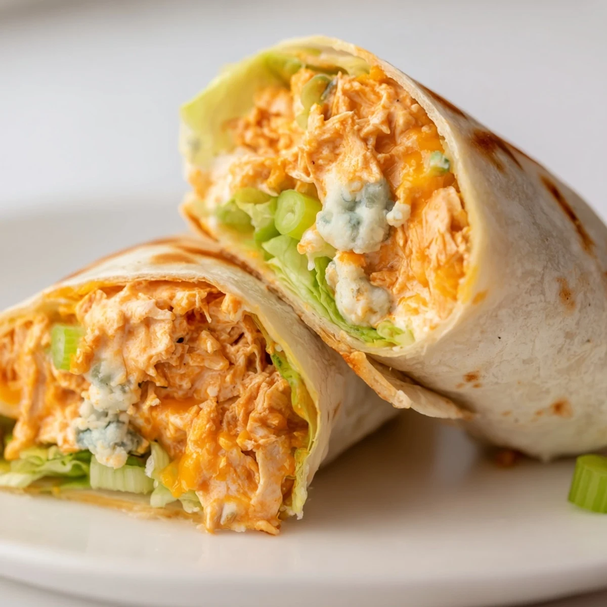 Savory Buffalo Chicken Dip Wrap, a quick, fulfilling lunch with creamy, cheesy filling and crisp lettuce.