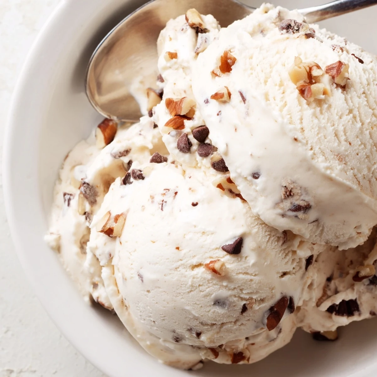 Cool, refreshing cottage cheese ice cream, swirled with fresh berries, looks delicious.