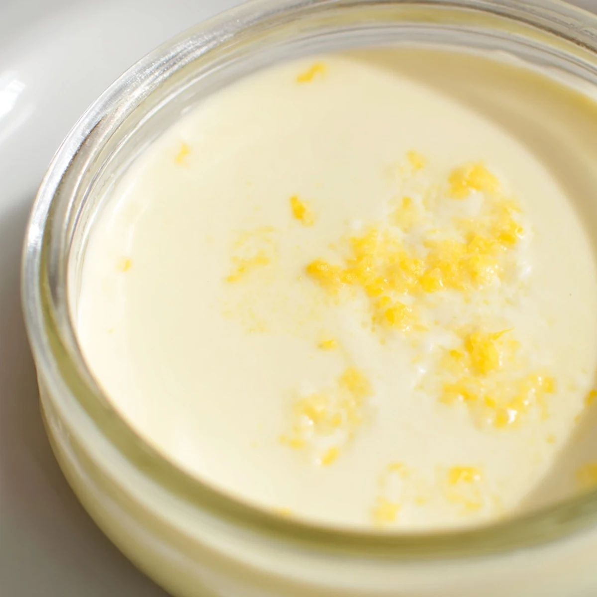 Creamy 3-Ingredient Lemon Posset, a chilled British dessert with a bright, tart flavor and smooth, silky texture.
