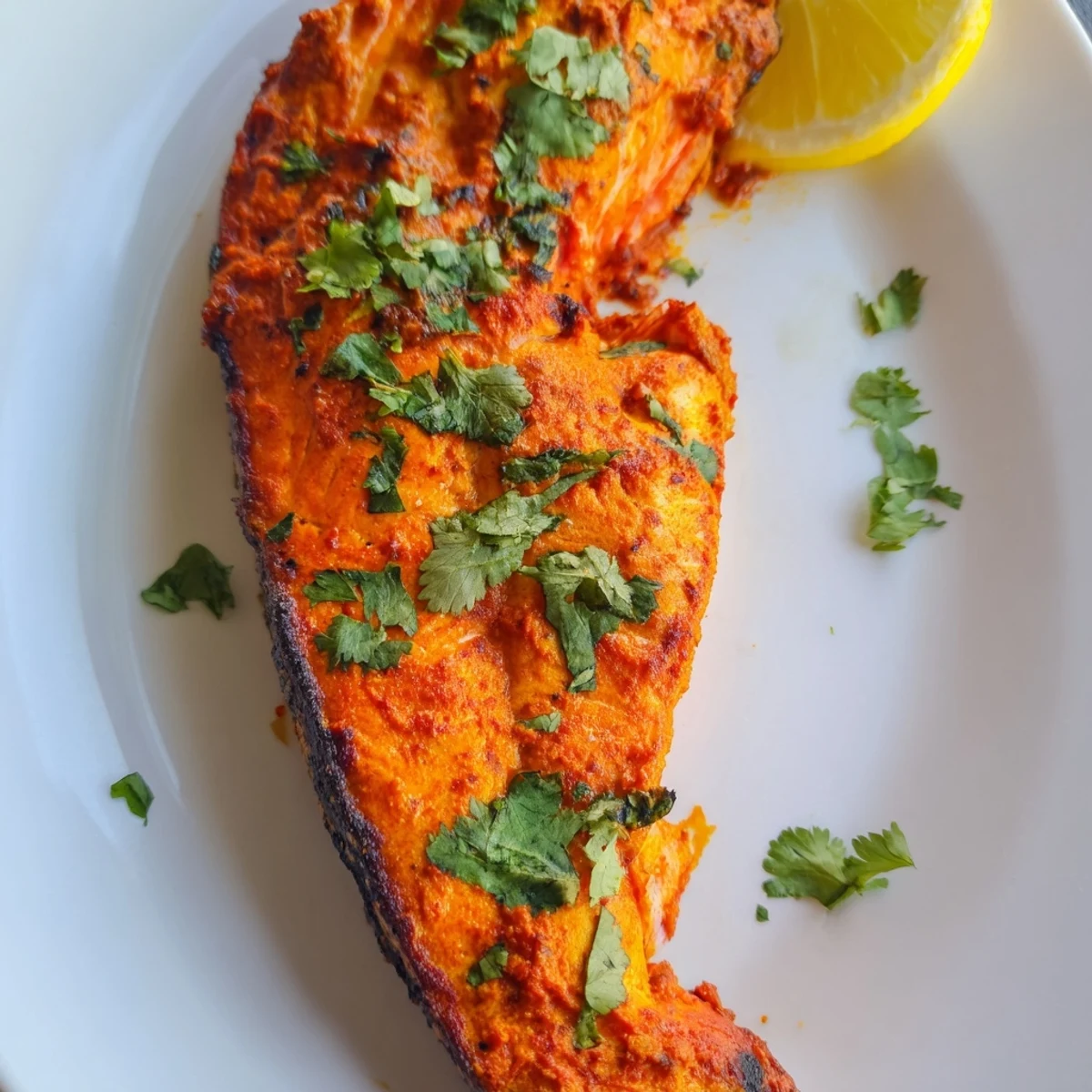 Delicious, flavorful Indian Tikka Salmon boasting tender, flaky salmon coated with spices.