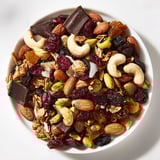 Golden-hued, crunchy Mountain High Adventure Snack Mix ready for a hike, packed in a clear bag.