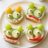 Delicious Prince Charming Froggy sandwiches, featuring creamy filling and radish cheeks, perfect for a lunch.