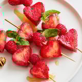 Freshly assembled Red Heart Fruit Skewers offer a healthy, colorful dessert option, perfect for sharing and enjoying.