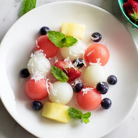 Vibrant Tropical Pineapple Platter, bursting with colorful fruits, ready for a refreshing summer snack.