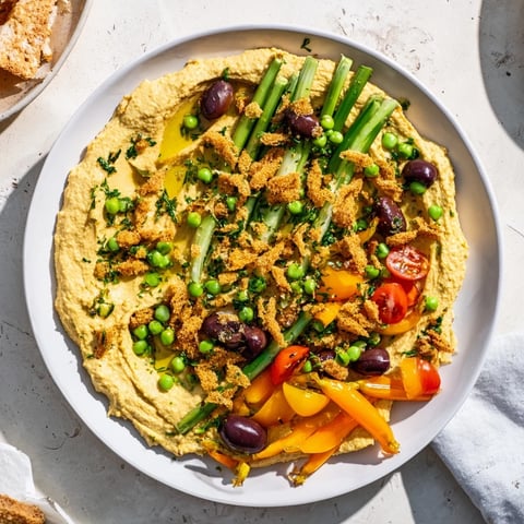 Vibrant Carrot Patch Veggie Board features colorful carrots and a "soil" dip for fun snacking.
