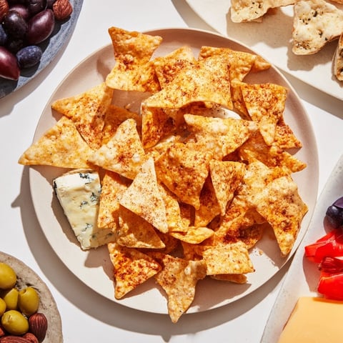 A Halloween board showcasing the spooky night bat treats with colorful fruits and savory bites.