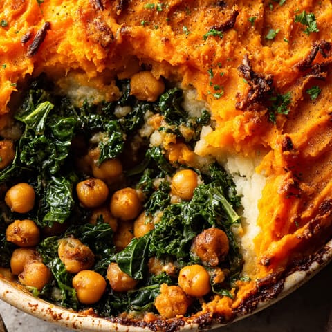 A dish with a variety of vegetables including broccoli, spinach, and carrots.