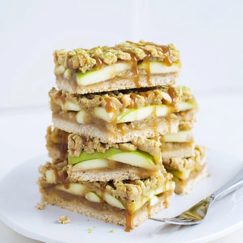 Earthy Matcha Caramel Apple Bars: A close-up showcasing layers of apple, caramel, and crumb.