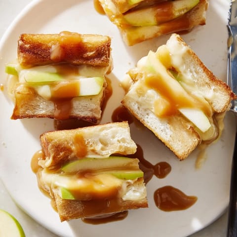 Warm, melted cheese oozing from tiny Caramel Apple Mini Grilled Cheese Bites; snack perfection.