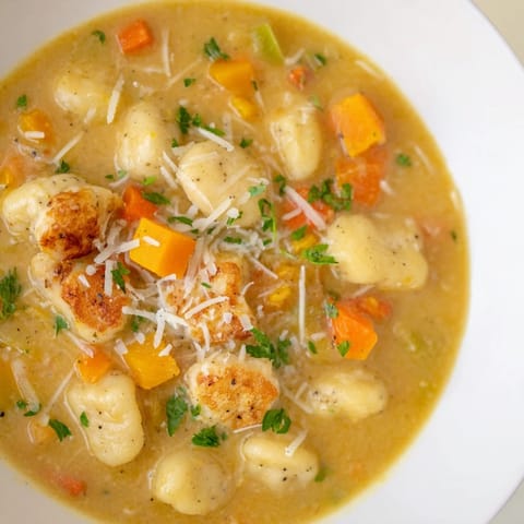 Velvety smooth, golden Savory Butternut Squash Gnocchi Soup, perfect for a cozy, comforting supper.