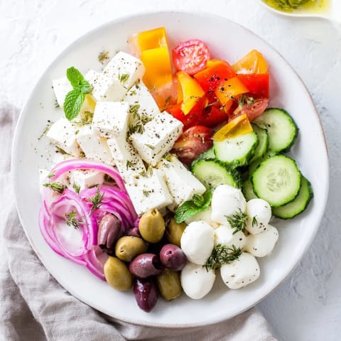 A close-up of The Sun-Drenched Patio mezze, with vibrant Mediterranean ingredients ready to enjoy.