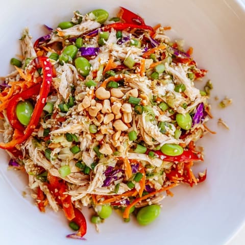 Freshly tossed Edamame Crunch Chicken Salad with crunchy vegetables and a vibrant, flavorful dressing.