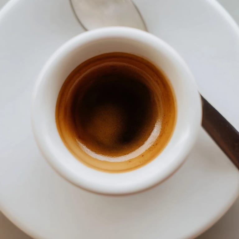 A cozy cup of brewed coffee, perfect for morning relaxation or enjoyment.  