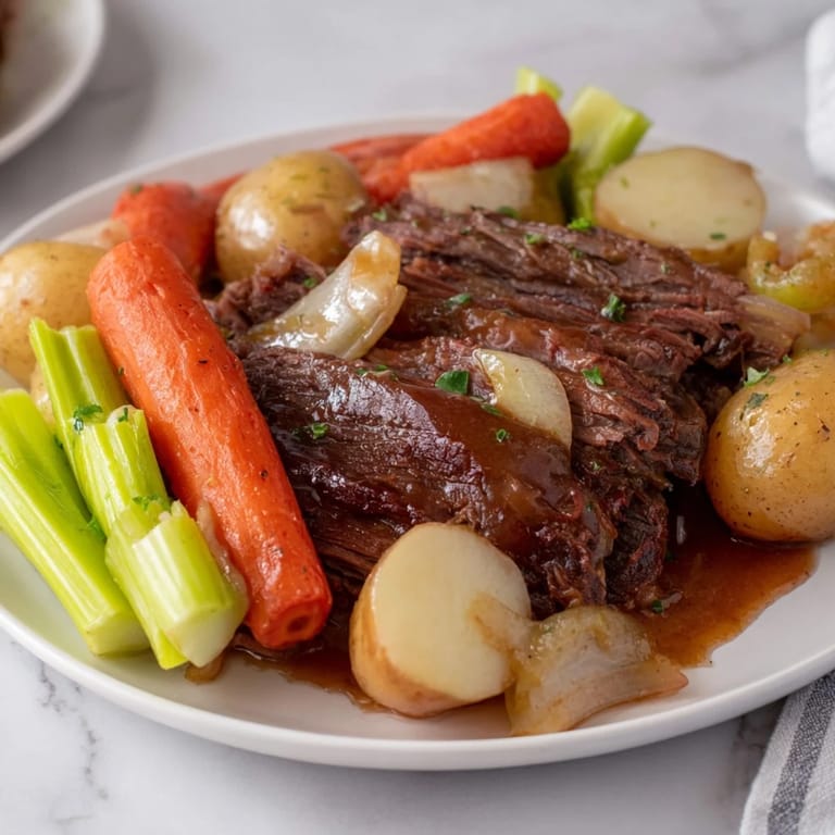 Delicious Pickle Brine Pot Roast, cooked until falling apart, perfect for a cozy Sunday dinner.